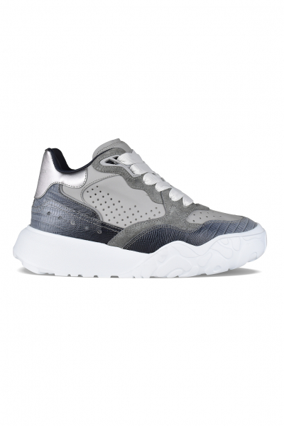 Buty sportowe Alexander McQueen w kolorze szarym.